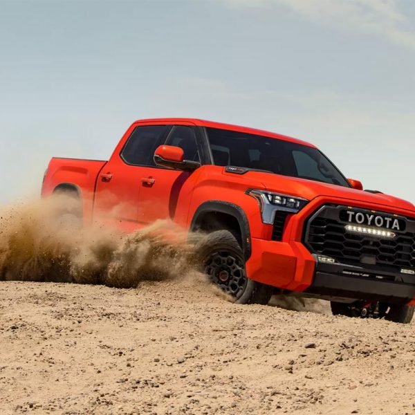 2022 Toyota Tundra TRD Pro in Orange Driving Through Dirt