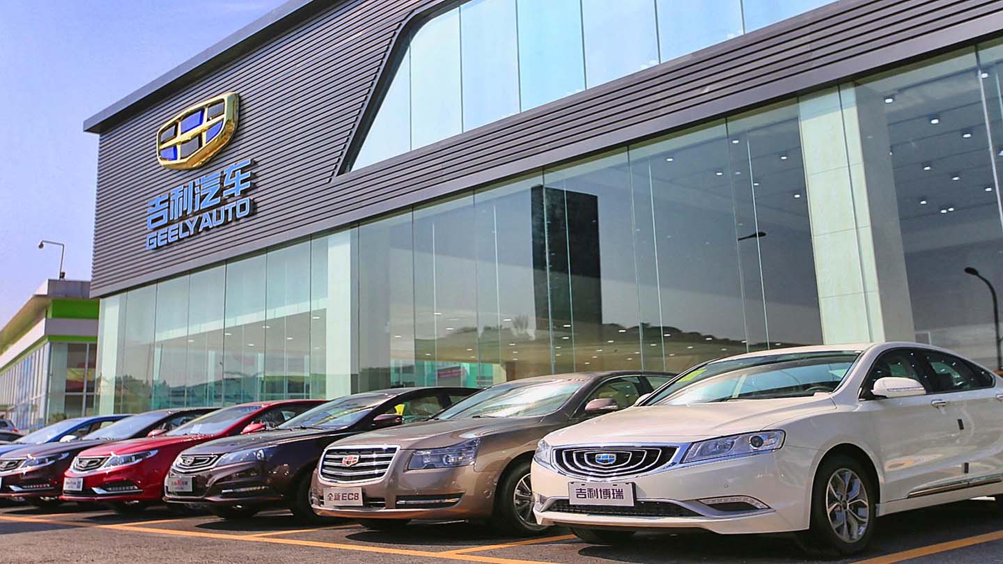 Geely Cars Lined Up in Front of Dealership