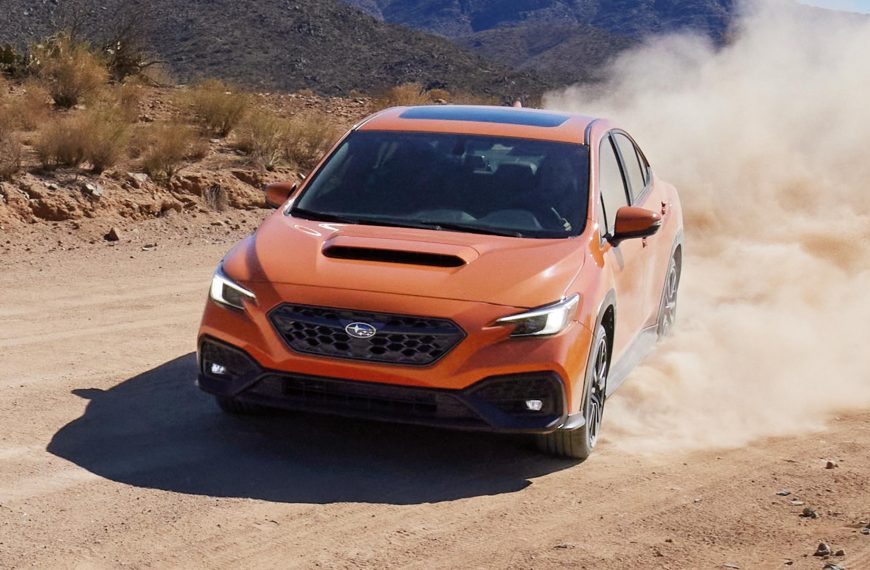 Front End View of 2022 Subaru WRX Sliding in Dirt