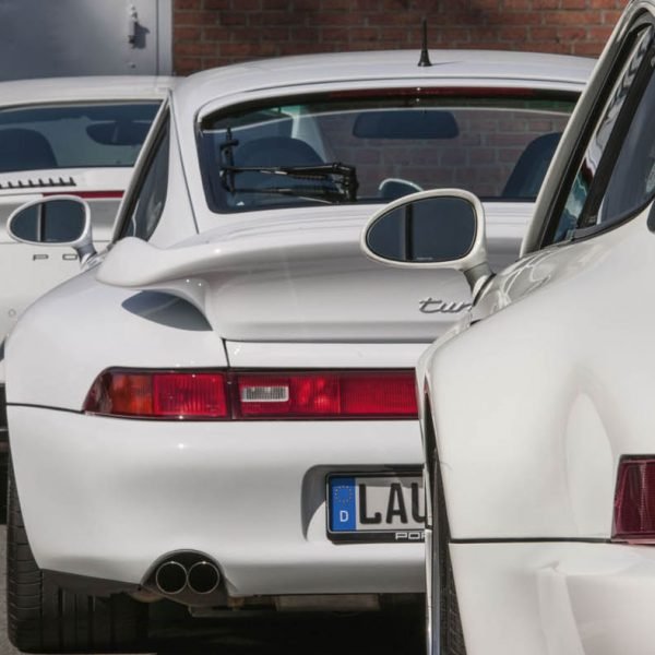 Three Porsche 911 Generations in White